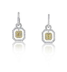 Yellow gold and diamond earrings isolated on white