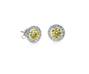 Yellow diamond citrine topaz stud earrings pair isolated on white