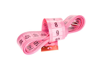 Pink flexible measuring tape hank isolated on white