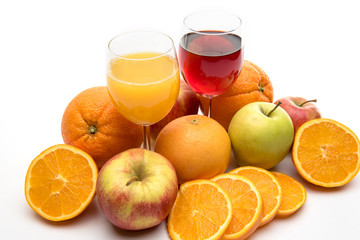 fresh orange, apple and grapefruit juice and fruits