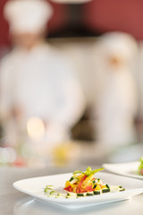 Close-up of stylish plate of colorful cut vegetables