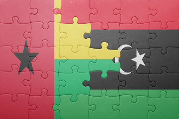 puzzle with the national flag of guinea bissau and libya