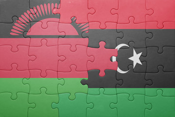 puzzle with the national flag of malawi and libya