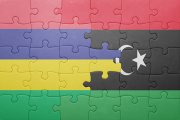 puzzle with the national flag of mauritius and libya