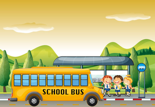 Children getting on school bus at bus stop