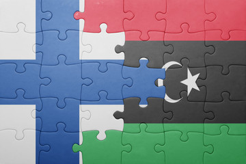puzzle with the national flag of finland and libya