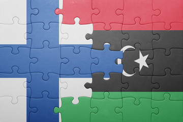 Fototapeta premium puzzle with the national flag of finland and libya