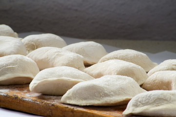 Fototapeta na wymiar Dumplings are hired prepared for cooking in hot water