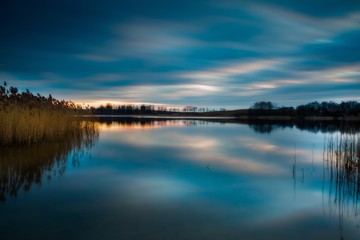 Fototapeta na wymiar Long exposure lake sunset