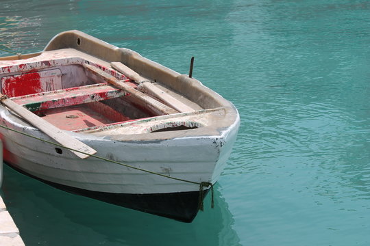 row boat on still sea ocean water calm relax