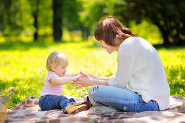 Young woman and her little son having fun