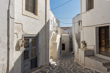 Fototapeta na wymiar Typical street in town of Parakia, Paros island, Cyclades, Greece