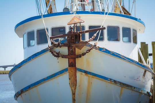 Fototapeta Front of fishing boat with anchor