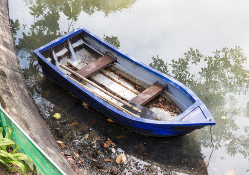 Old plastic rowboat
