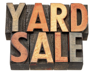 yard sale banner in wood type