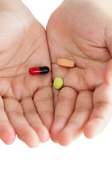 Pills medicine tablets in doctor hand