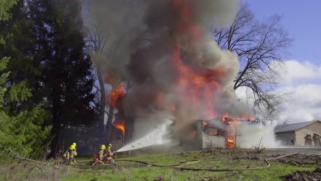 Firefighters can't stop huge flames from burning down a house 
