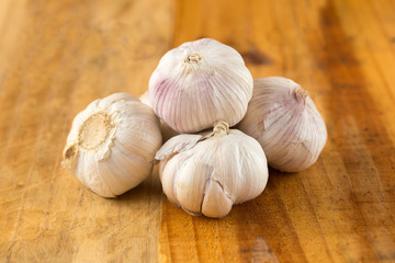 Garlic on wood background