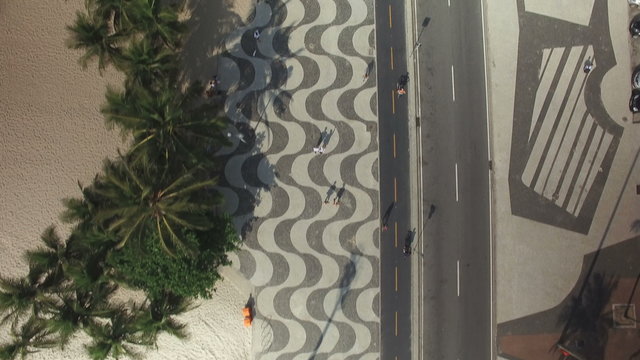 Flying above Copacabana Beach mosaic sidewalk, Rio de Janeiro, Brazil