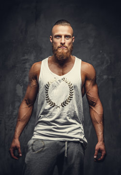 Bearded man in a t shirt.