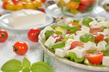 Vegetarian salad with cherry tomatoes, eggs and cheese