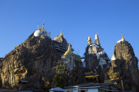 Taung Kwe Paya, an unusual buddhist temple erected on big rocks. It is the most famous temple of kaya state, Myanmar.