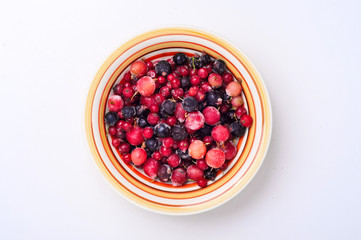 Ripe summer berries in ice