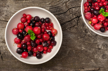 Ripe summer berries with mint and ice