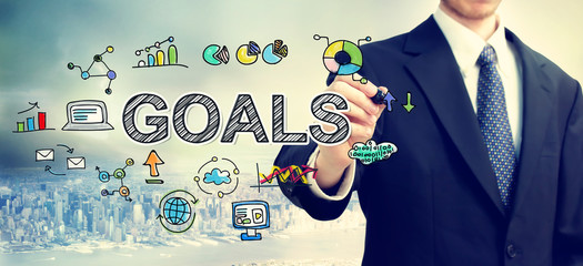 Businessman drawing Goals concept