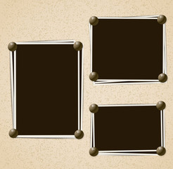 Obraz premium Photo frames composition with pins on retro background. Vector
