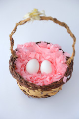 Fototapeta na wymiar White Easter Eggs On A Pink Background 