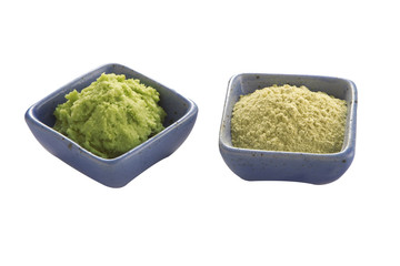 japanese wasabi in ceramic cup on white background