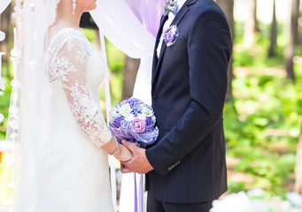 Couple Getting Married at an Outdoor Wedding Ceremony, 