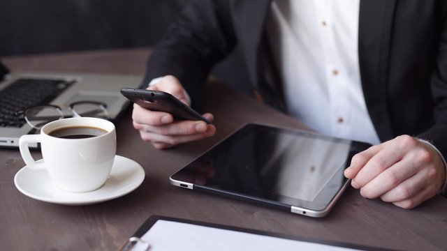 Using smart watch smartphone tablet laptop and computer