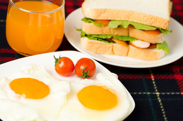 Breakfast,meal,fried egg,sandwich,orange juice