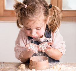 little girl baking
