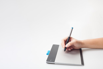graphic designer hands writing on digital tablet with copy space for graphic design or website