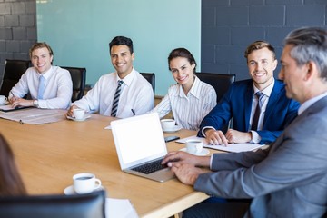 Businesspeople sitting in conference room during a meeting