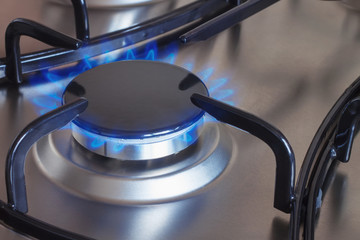 gas burning on the kitchen gas stove