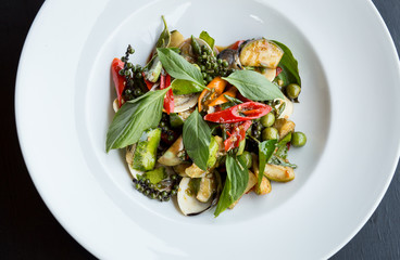 Stir fried seafood with curry Thailand.