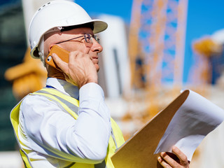 Engineer builder at construction site