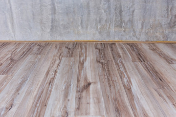cement mortar wall background and wood floor in the room