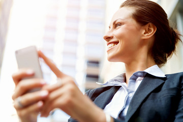 Portrait of business woman smiling outdoor