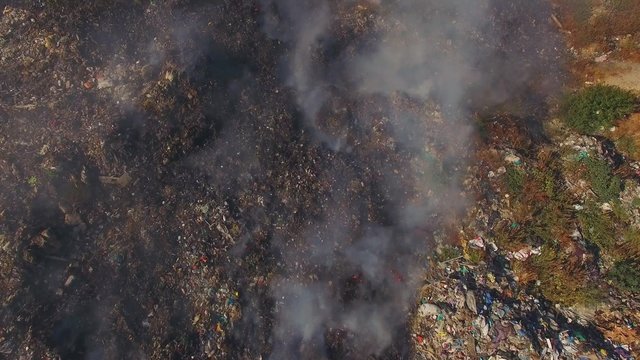 Huge Burning Waste Deposit Covered With Smoke