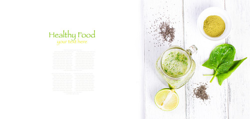 Healthy green smoothie with spinach, kiwi, banana, chia seeds, lime and green tea matcha in a glass...