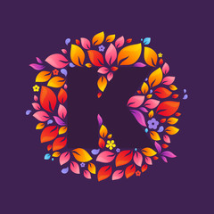 Fototapeta premium K letter logo in a circle of flames.