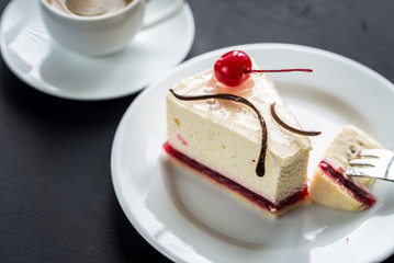 Raspberry cheesecake with sweet cherry