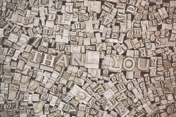 Close up of typeset letters with the words Thank You