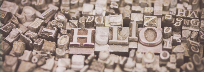 Close up of typeset letters with the word Hello