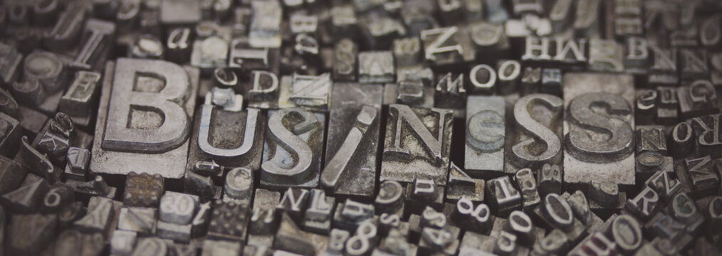 Close up of typeset letters with the word Business